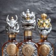 Spiral wine cap in the shape of a lion dance.