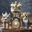 Spiral wine cap in the shape of a lion dance.